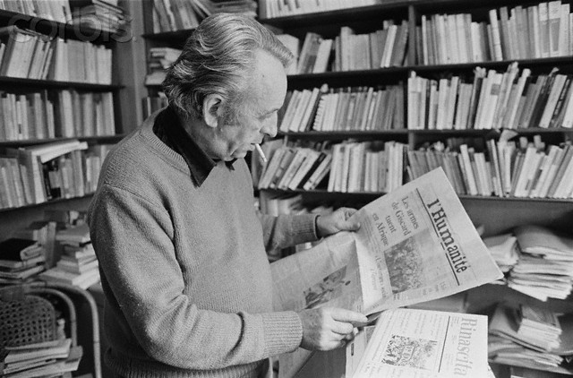 19 May 1978, Paris, France --- Portrait of Communist political philosopher Louis Althusser reading the Communist daily newspaper L'Humanite in his home. He murdered his wife in 1980 and was confined in an asylum until his death. --- Image by © Jacques Pavlovsky/Sygma/CORBIS